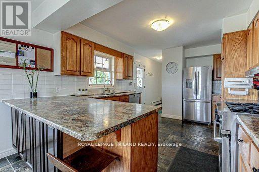1281 Scotland Drive, London, Ontario  N6N 1L1 - Photo 6 - X12010159