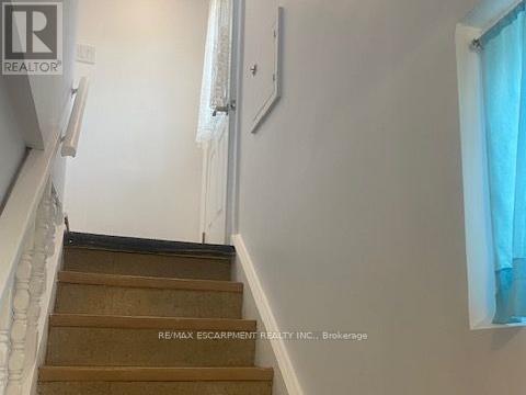 27 Woodenhill Court, Toronto, Ontario  M6M 1K8 - Photo 2 - W12004482