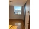 Unfurnished room featuring parquet floors