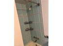 Bathroom featuring shower / washtub combination