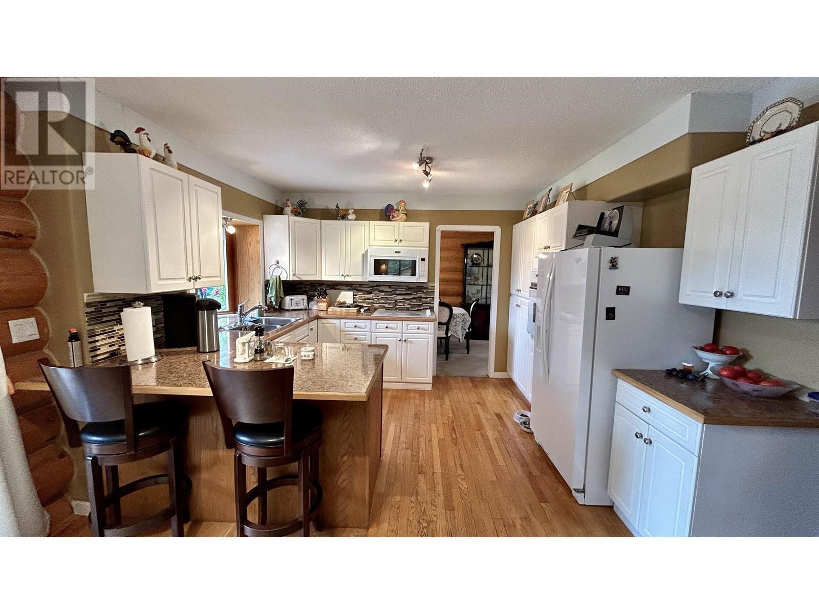 4906 Kitwanga Drive, 108 Mile Ranch, British Columbia  V0K 2Z0 - Photo 6 - R2976081