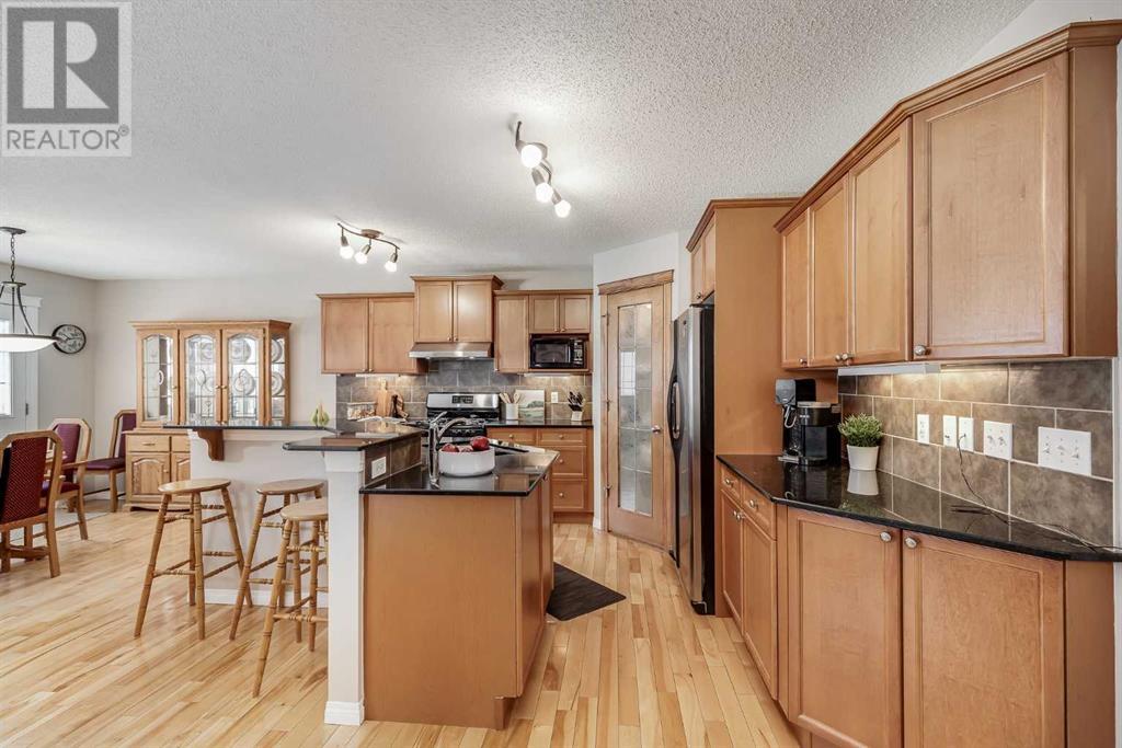 505 Coopers Drive Sw, Airdrie, Alberta  T4B 3M5 - Photo 5 - A2194483