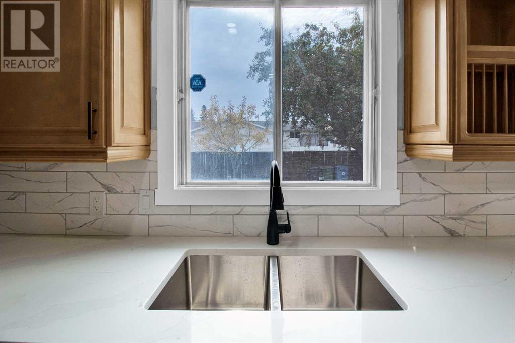 115 Bracewood Way Sw, Calgary, Alberta  T2W 3C3 - Photo 10 - A2192884
