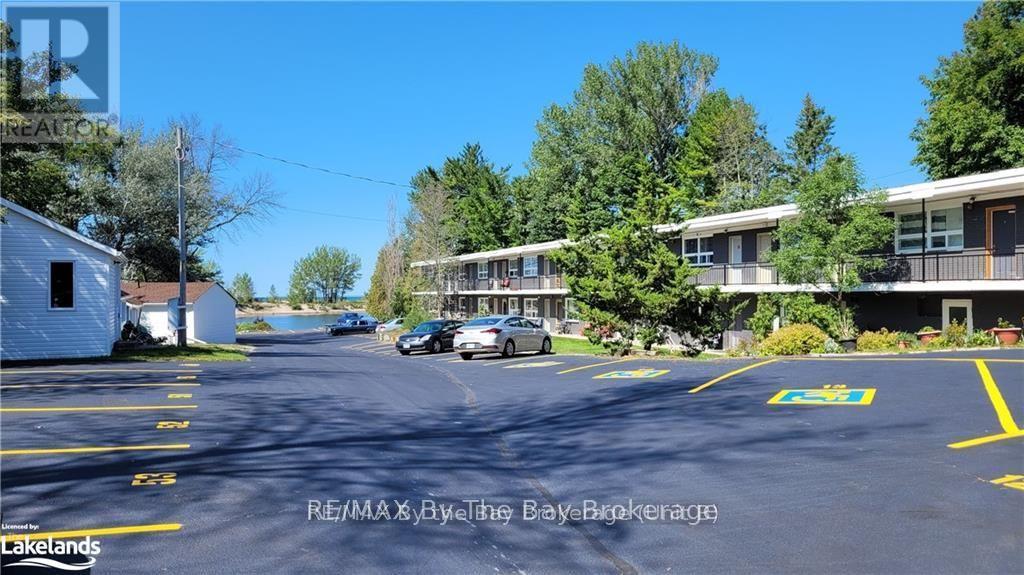 A08 - 280 River Road E, Wasaga Beach, Ontario  L9Z 2L7 - Photo 1 - S12012877