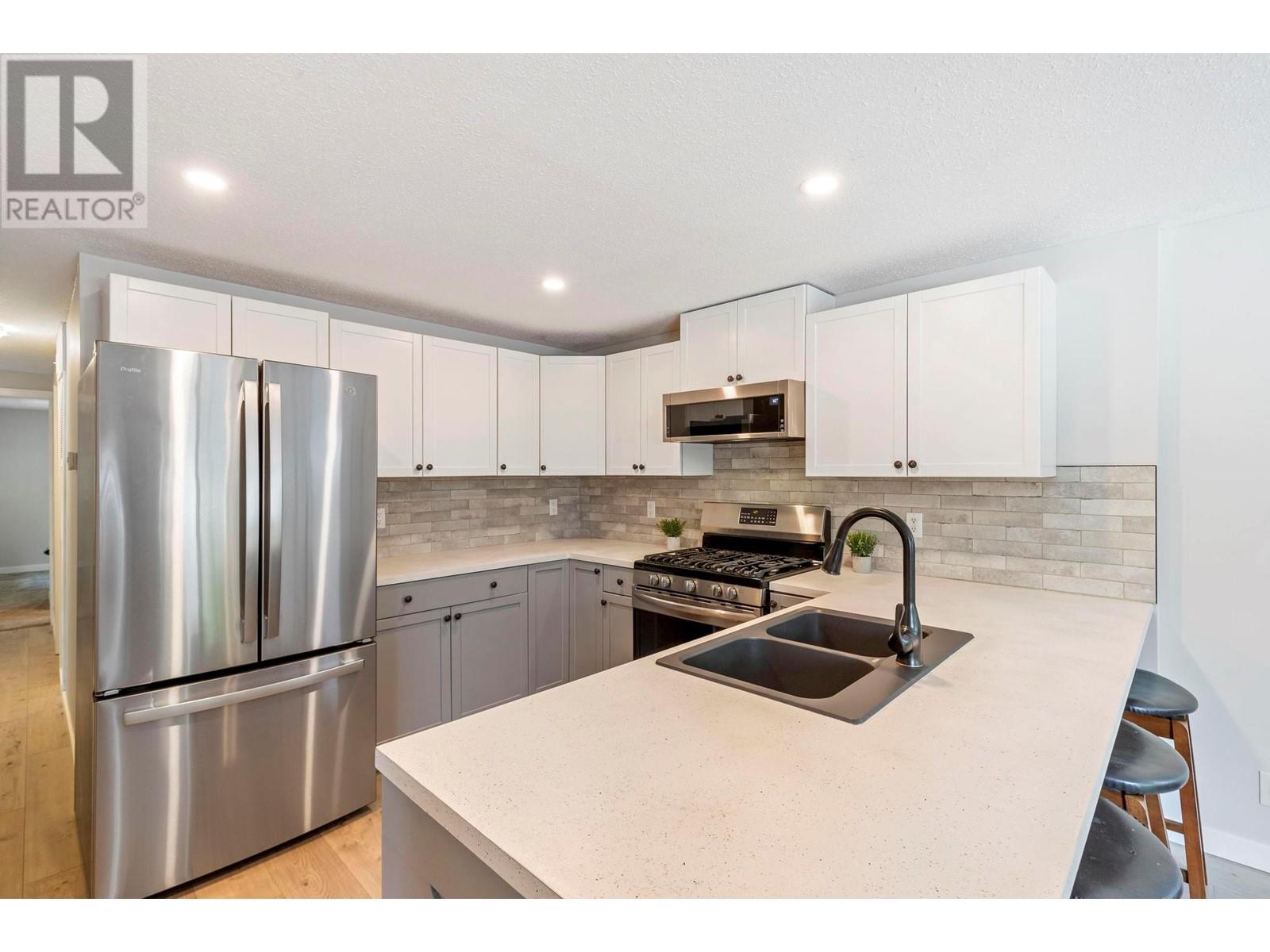 Property at 2035 Boucherie Road Unit# 56 image 4
