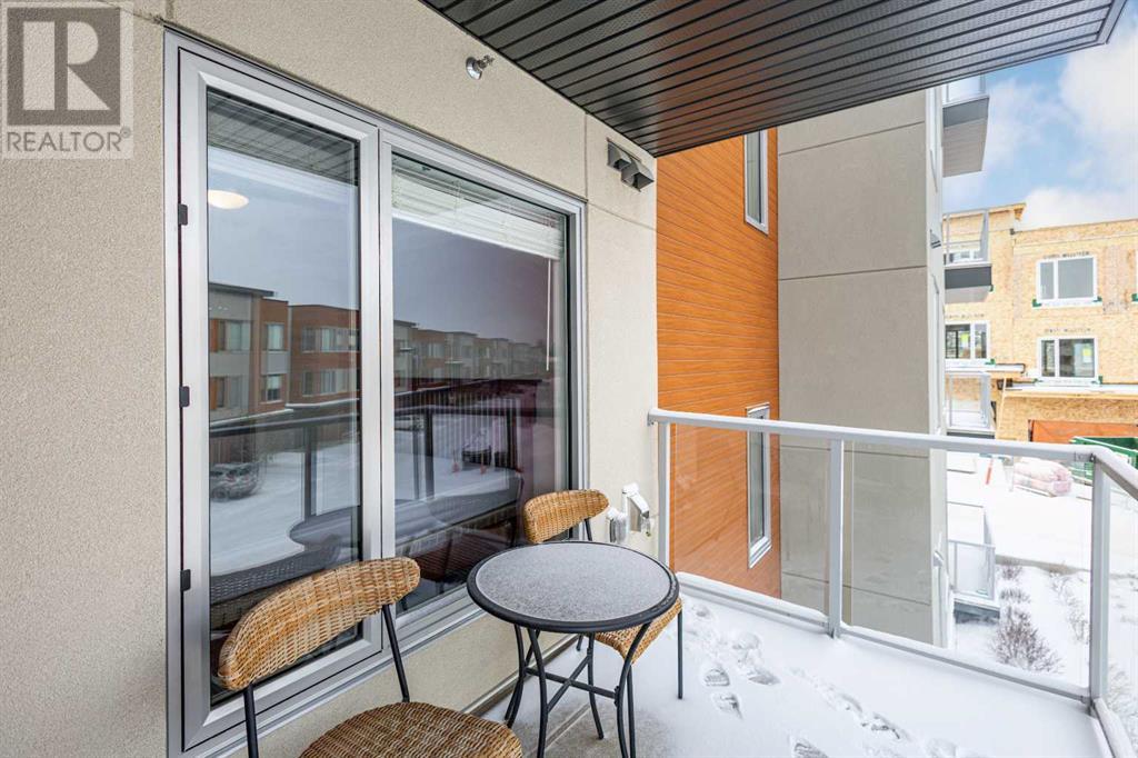 211, 71 Shawnee Common Sw, Calgary, Alberta  T2Y 0R2 - Photo 30 - A2193530