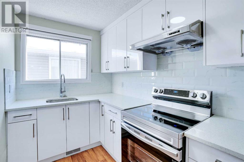 59 Falchurch Road Ne, Calgary, Alberta  T3J 1G6 - Photo 7 - A2193537