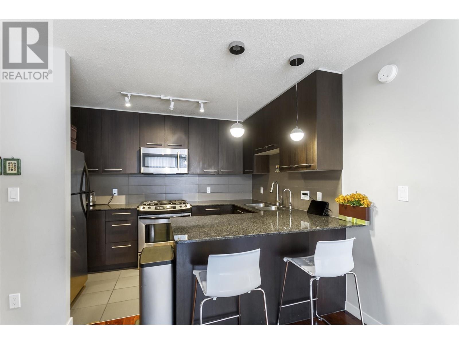 2003 2979 Glen Drive, Coquitlam, British Columbia  V3B 0B2 - Photo 6 - R2976407