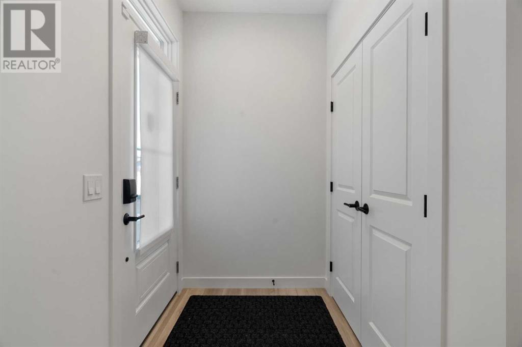 8 Rowley Common Nw, Calgary, Alberta  T3L 0G4 - Photo 3 - A2197332