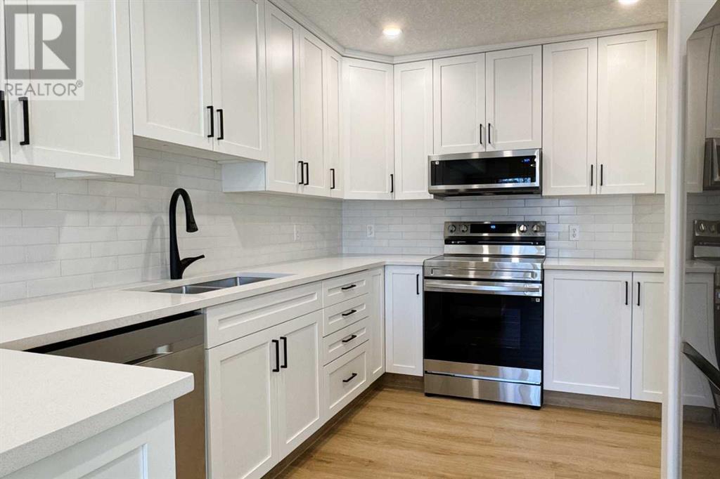211, 7239 Sierra Morena Boulevard Sw, Calgary, Alberta  T3H 3L7 - Photo 9 - A2198629