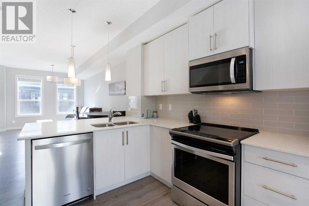 90 Legacy Path Se, Calgary, Alberta  T2X 4H9 - Photo 4 - A2195414