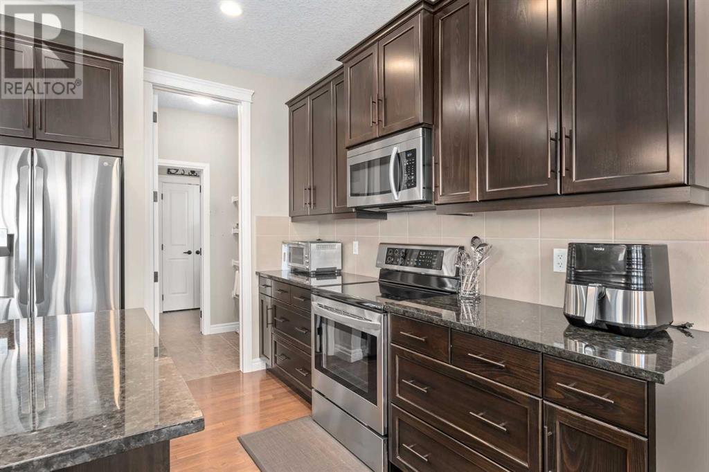 186 Heritage Boulevard, Cochrane, Alberta  T4C 0S6 - Photo 7 - A2196552