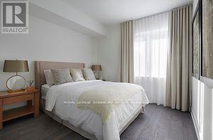 Th8 - 5 Mabelle Avenue, Toronto, Ontario  M9A 0C8 - Photo 4 - W12017466