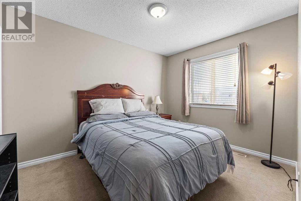 83 Cimarron Trail, Okotoks, Alberta  T1S 2E5 - Photo 19 - A2195904