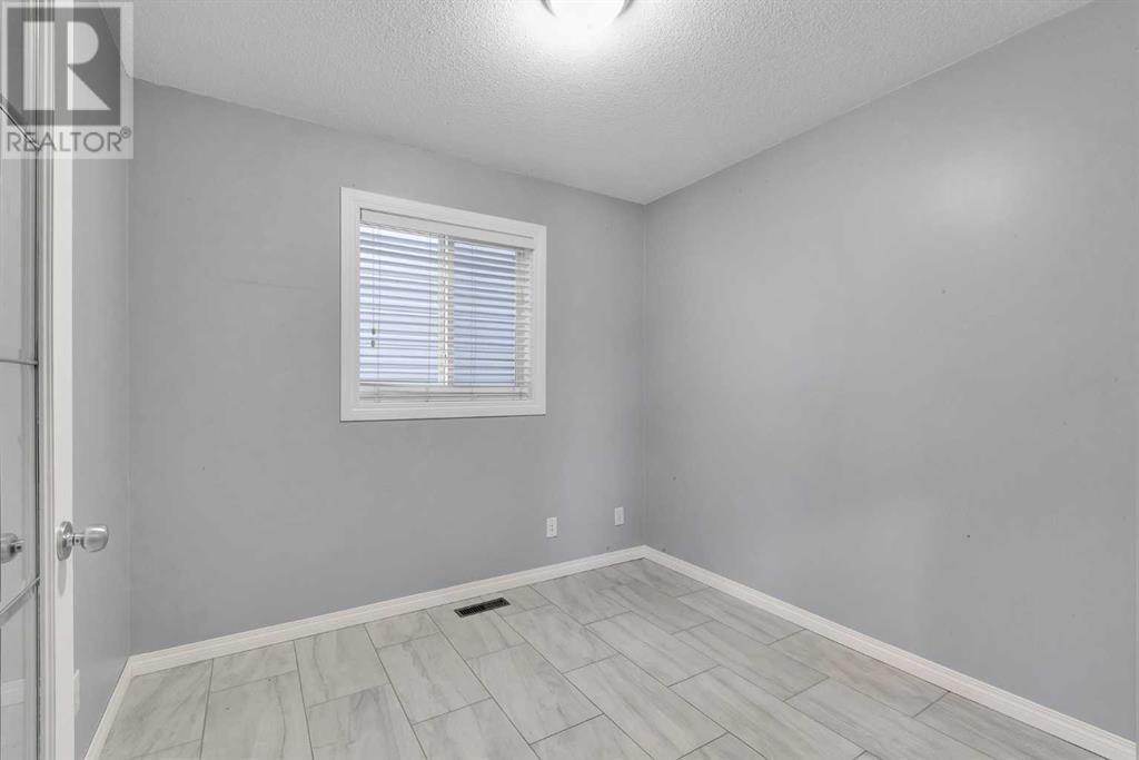 7 Rockyspring Green Nw, Calgary, Alberta  T3G 6A3 - Photo 17 - A2200154
