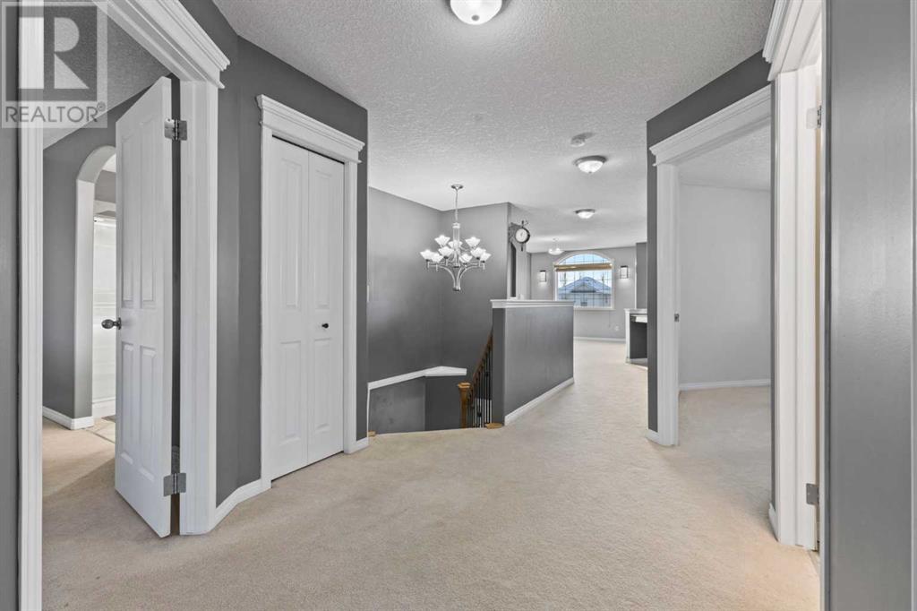 321 Crystal Shores View, Okotoks, Alberta  T1S 2H9 - Photo 27 - A2187474