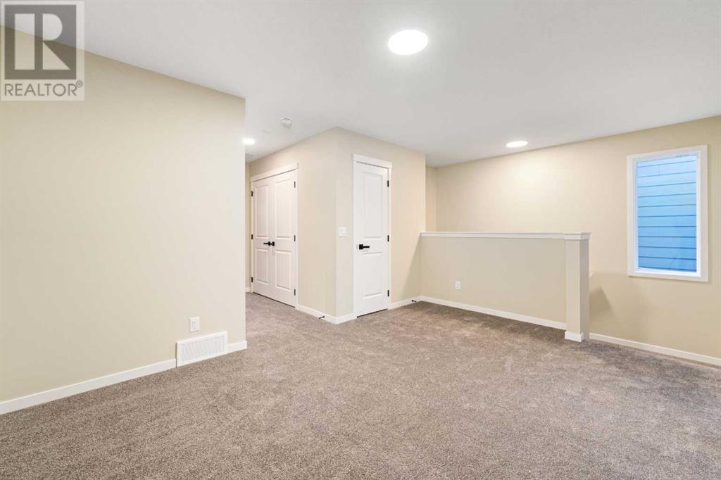 32 Rowmont Common Nw, Calgary, Alberta  T3L 0L3 - Photo 26 - A2201121