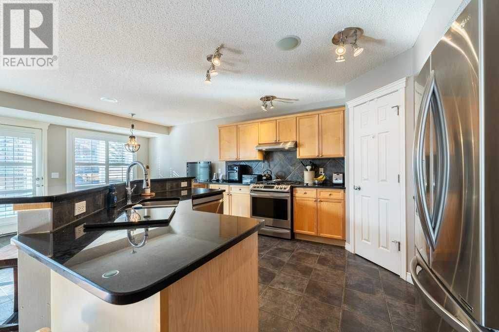 512 Cougar Ridge Drive Sw, Calgary, Alberta  T3H 5A3 - Photo 6 - A2198461