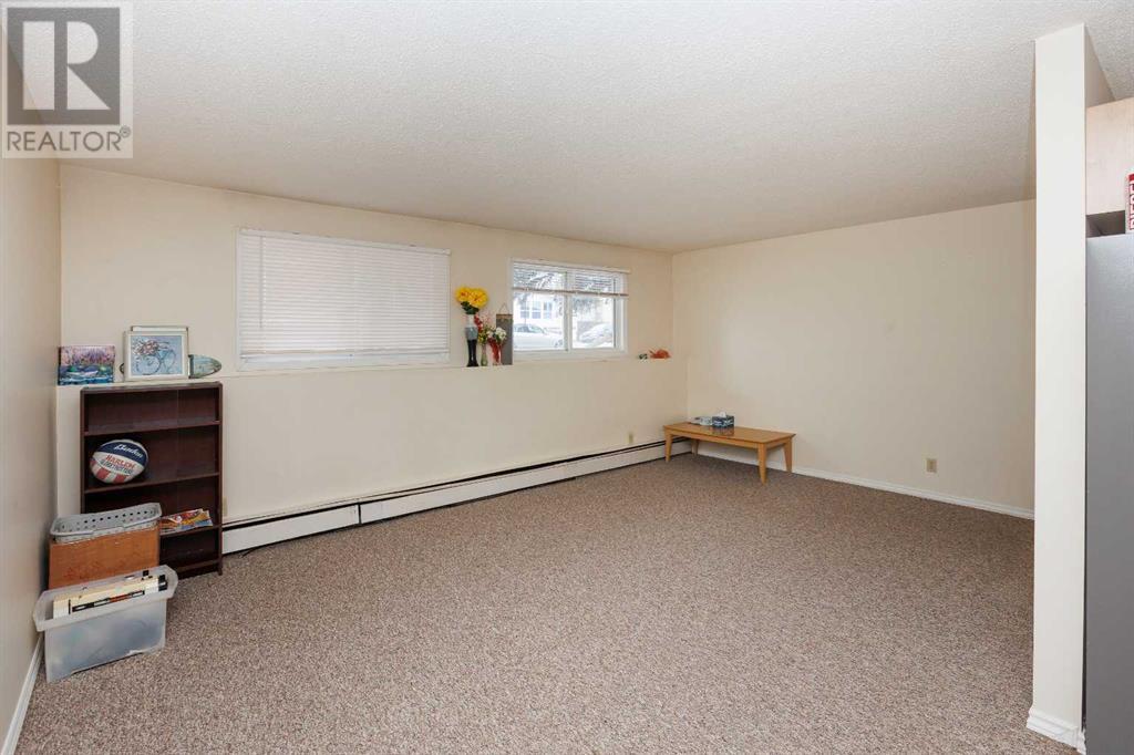 101-306, 5415 54 Street, Ponoka, Alberta  T4J 1M9 - Photo 11 - A2202151