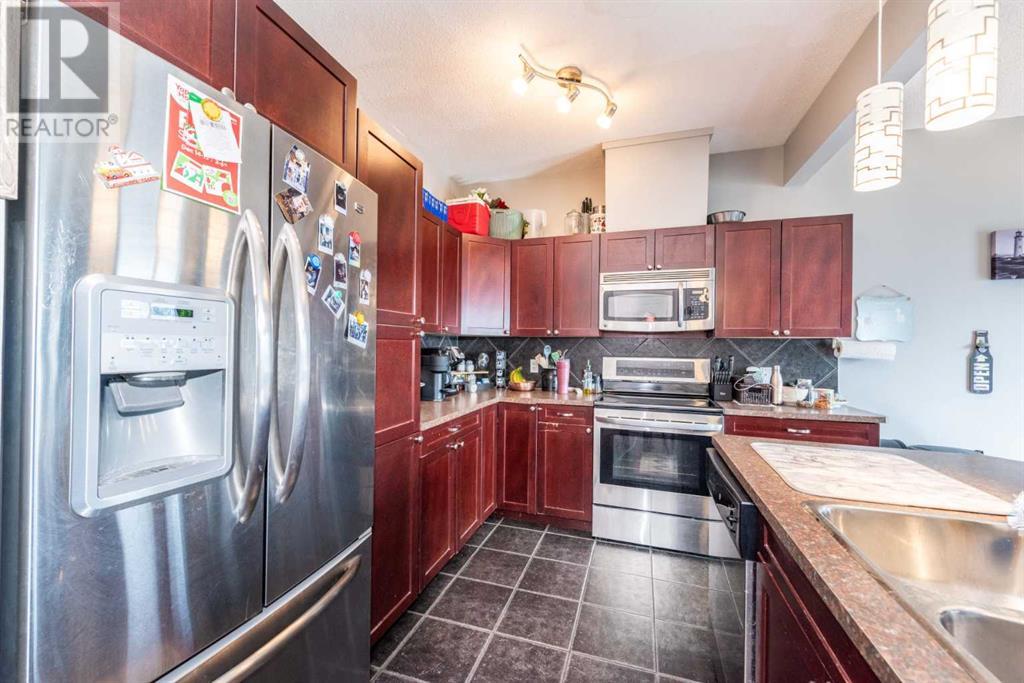 804, 620 Luxstone Landing Sw, Airdrie, Alberta  T4B 0B6 - Photo 7 - A2198786