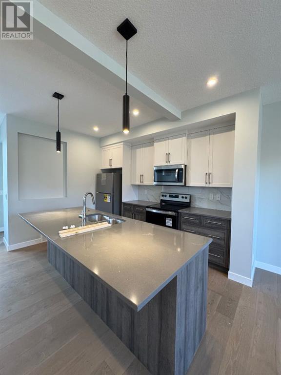 256 Waterford Heath, Chestermere, Alberta  T1X 2T8 - Photo 5 - A2166734