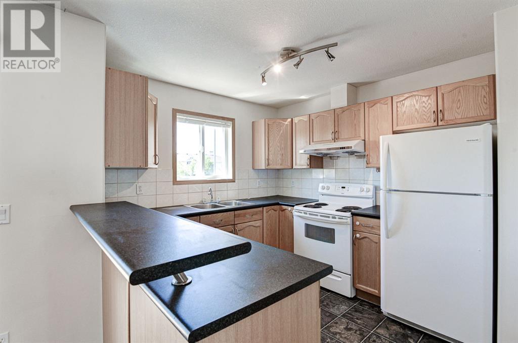 26, 49 Rocky Ridge Gate Nw, Calgary, Alberta  T3G 4P7 - Photo 6 - A2202142
