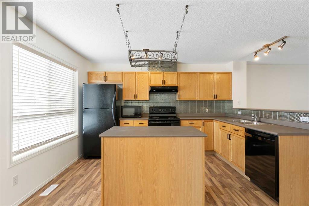 176 Tuscany Court Nw, Calgary, Alberta  T3L 2Y7 - Photo 7 - A2201227