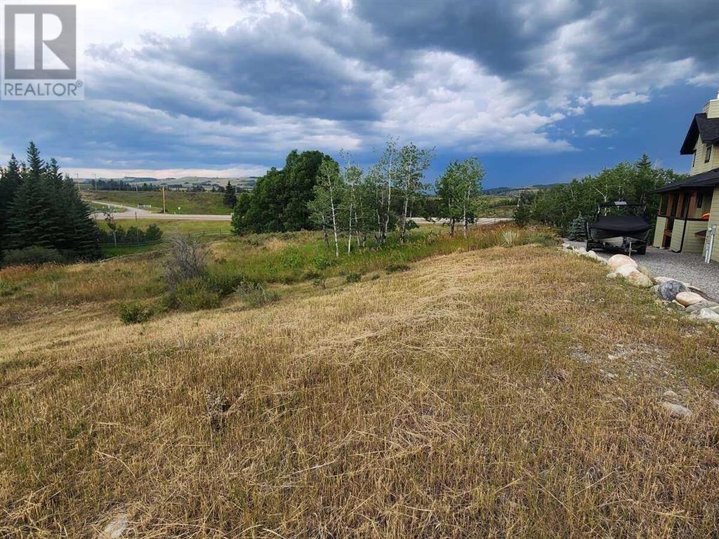 430 Cottageclub Cove, Rural Rocky View County, Alberta T4C 1B1 - Photo 12 - A2202942
