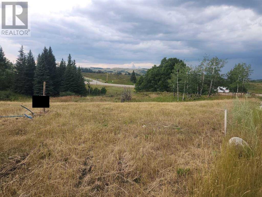 430 Cottageclub Cove, Rural Rocky View County, Alberta T4C 1B1 - Photo 3 - A2202942