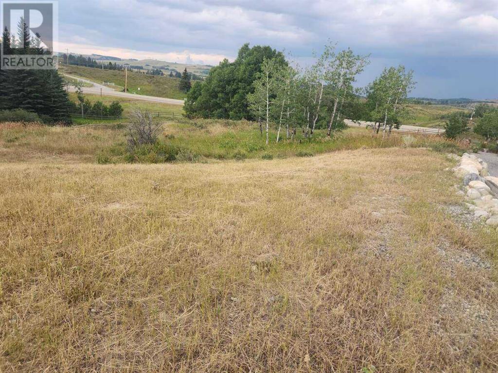 430 Cottageclub Cove, Rural Rocky View County, Alberta T4C 1B1 - Photo 4 - A2202942