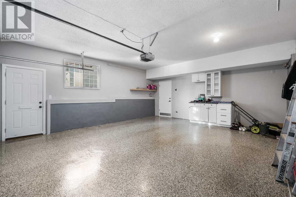 307 Woodside Bay Sw, Calgary, Alberta  T2W 3K9 - Photo 40 - A2195578