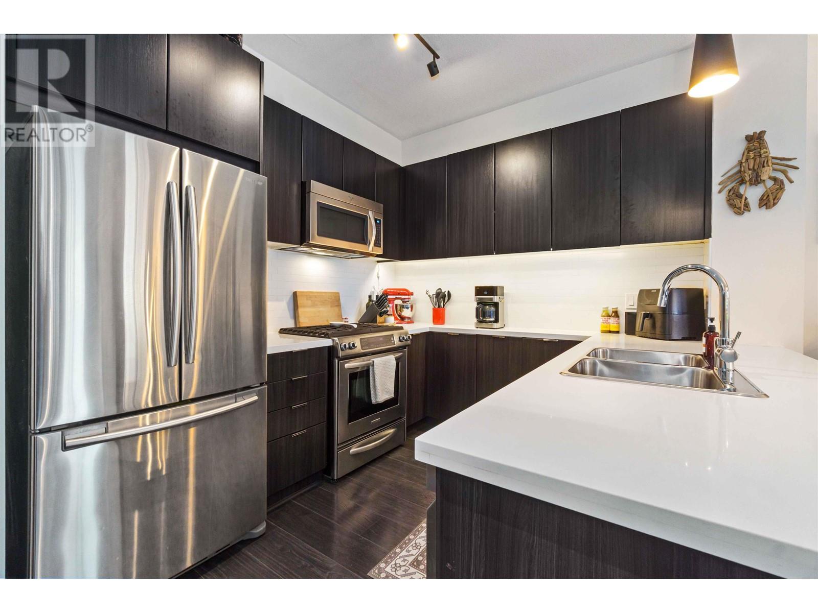 103 3107 Windsor Gate, Coquitlam, British Columbia  V3B 0J3 - Photo 4 - R2978242