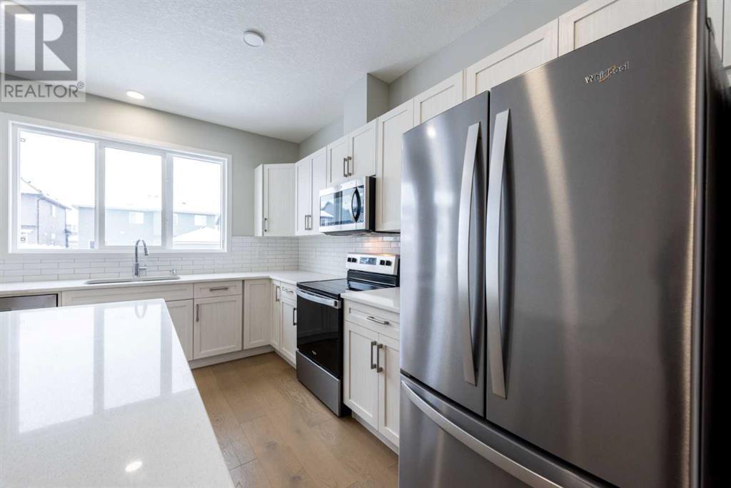 52 Legacy Reach View, Calgary, Alberta  T2X 4T8 - Photo 5 - A2199206