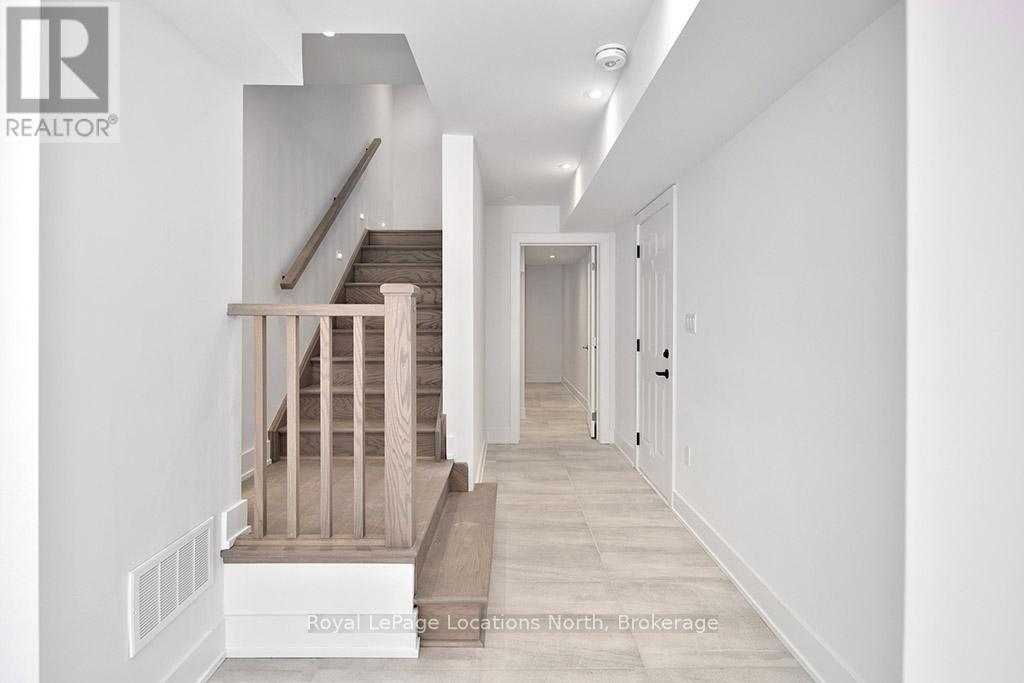 18 - 117 Sladden Court, Blue Mountains, Ontario  N0H 2P0 - Photo 4 - X12025474