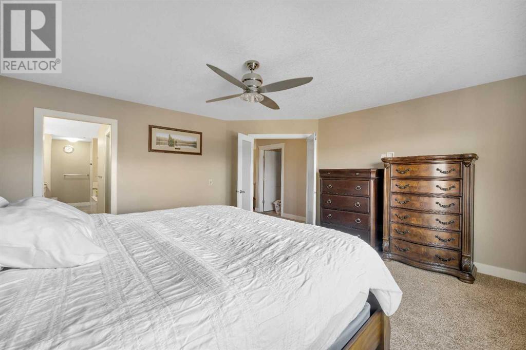 1122 Coopers Drive Sw, Airdrie, Alberta  T4B 0Z8 - Photo 31 - A2190504