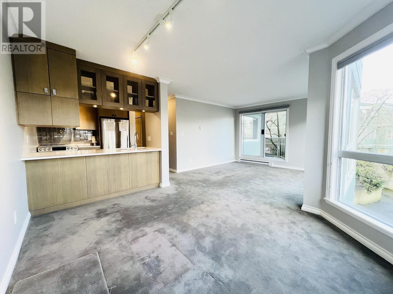 Property at 302 1508 MARINER WALK image 4