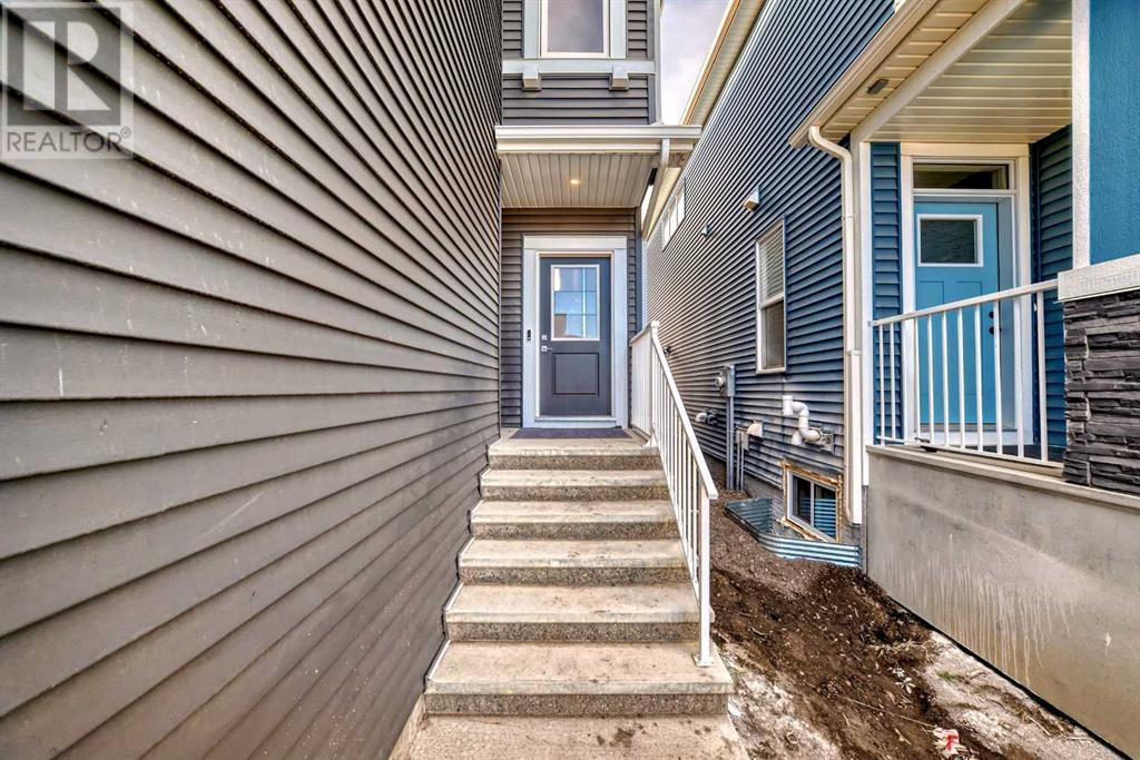 202 Creekstone Path Sw, Calgary, Alberta  T2X 4Z4 - Photo 3 - A2191544