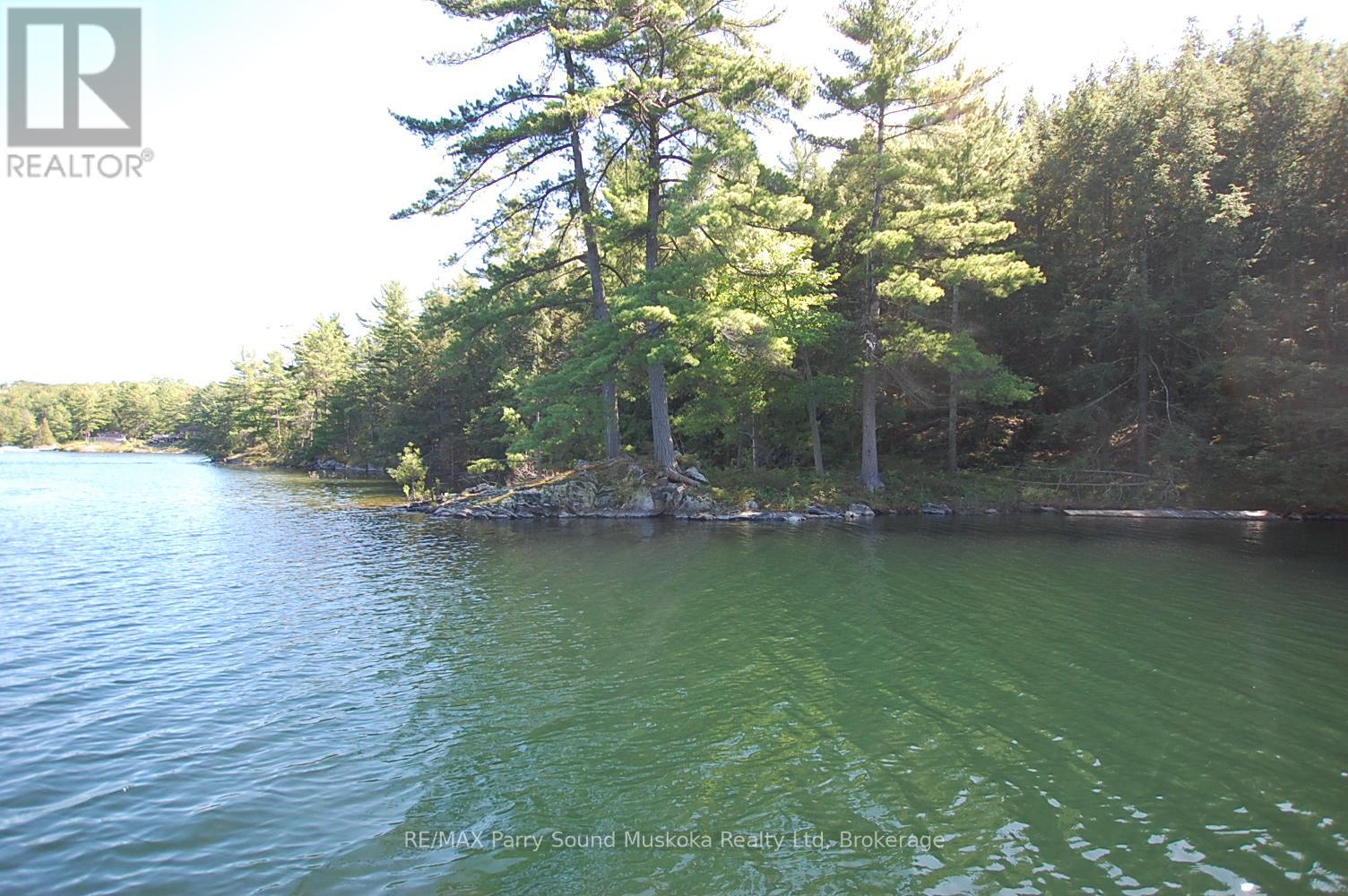52b Rose Island, Carling, Ontario  P0G 1G0 - Photo 7 - X12027268