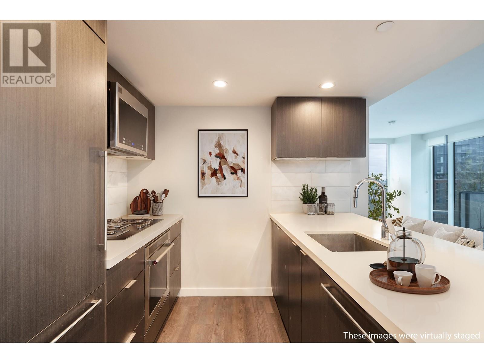 402 8238 Lord Street, Vancouver, British Columbia  V6P 0G7 - Photo 2 - R2978773