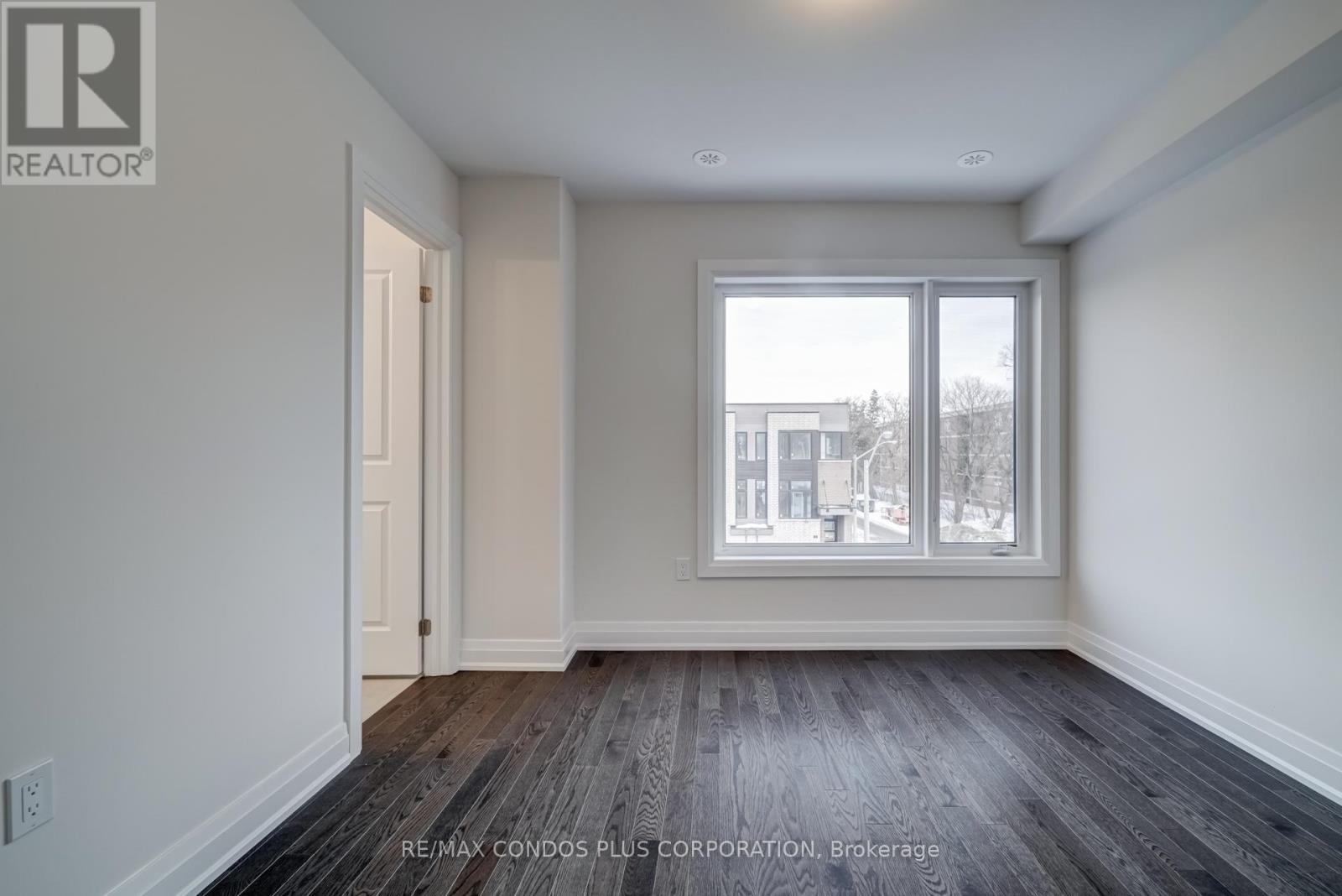 4 Wild Rose Gardens, Toronto, Ontario  M6L 0A5 - Photo 4 - W12028047