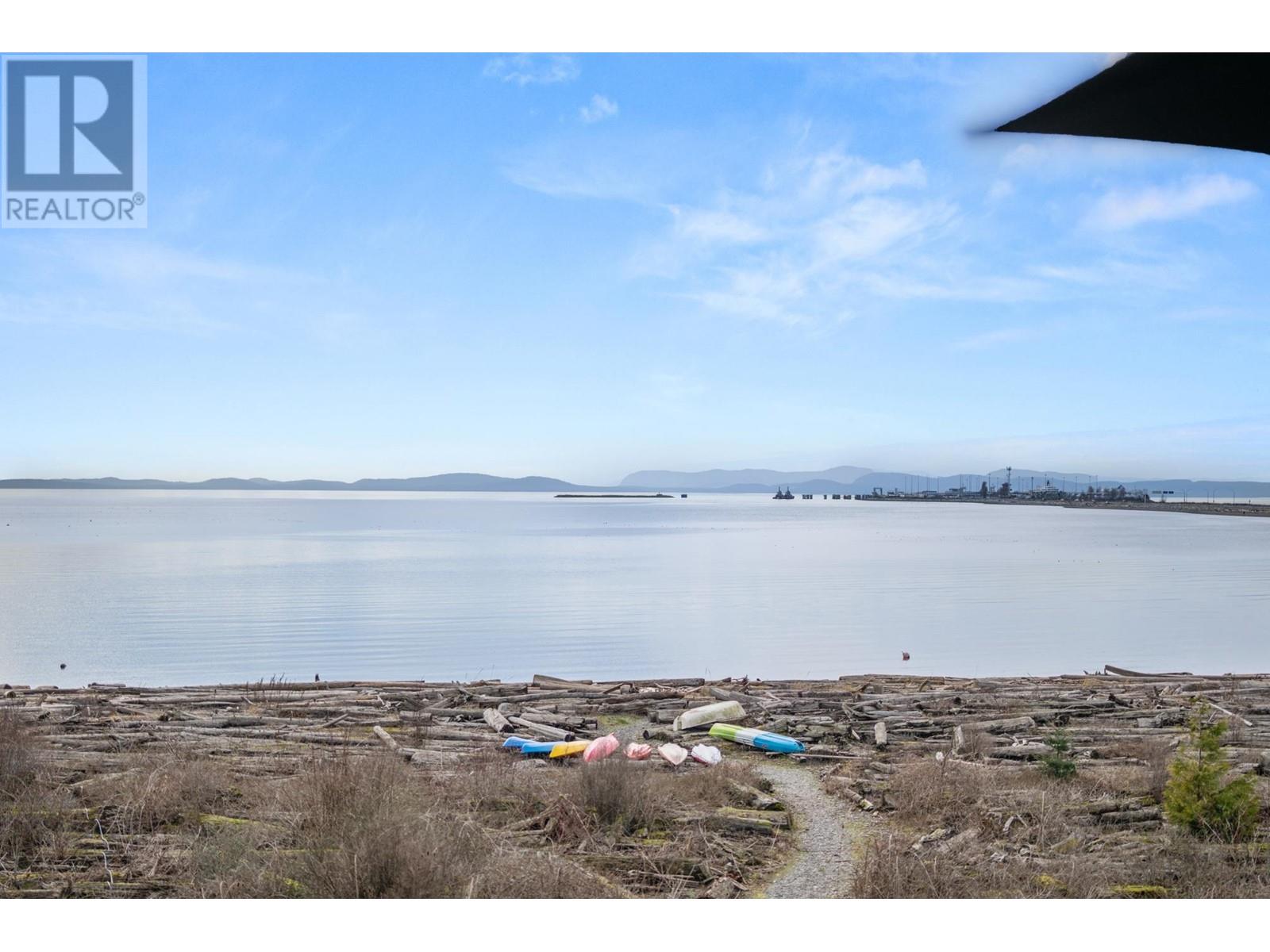 203 1120 Tsatsu Shores Drive, Tsawwassen, British Columbia  V4M 4G3 - Photo 4 - R2976411