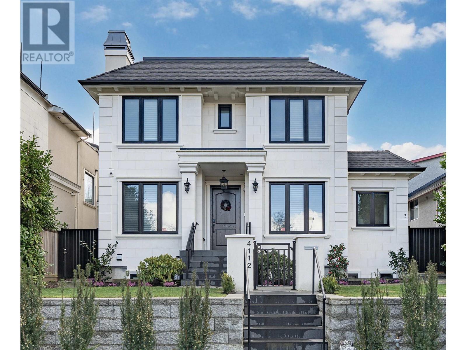 Property at 4112 W 11TH AVENUE image 2