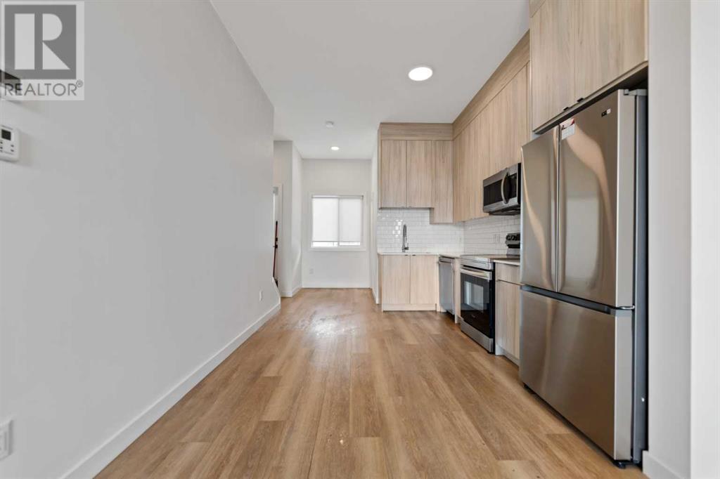 402, 101 Panatella Square Nw, Calgary, Alberta  T3K 2R9 - Photo 12 - A2204211