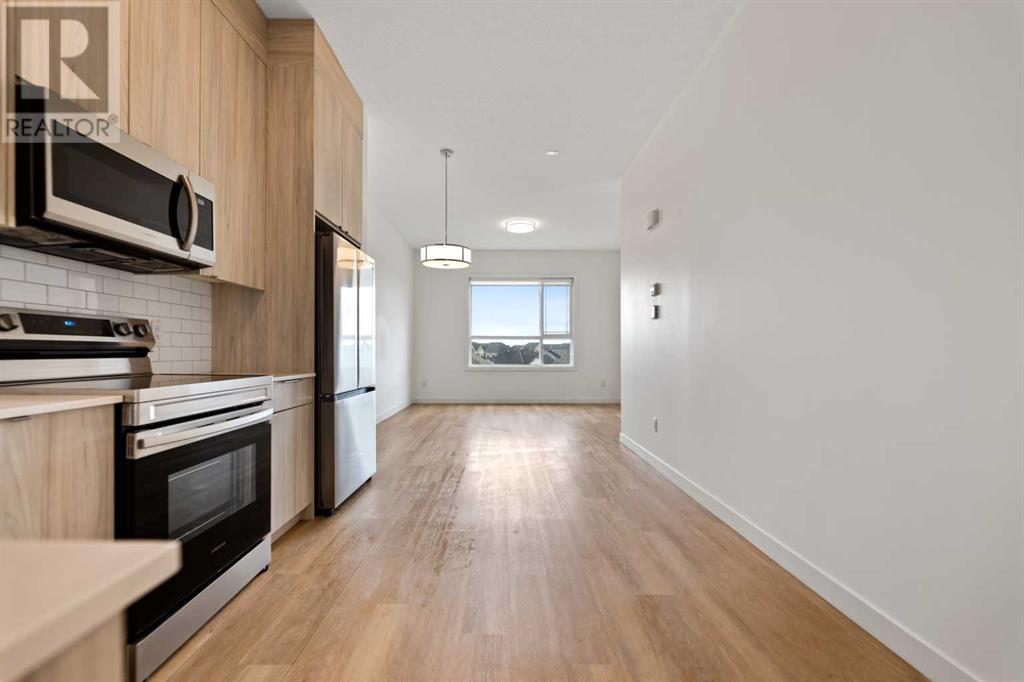 402, 101 Panatella Square Nw, Calgary, Alberta  T3K 2R9 - Photo 15 - A2204211