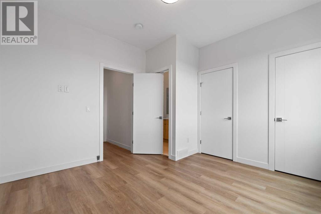 402, 101 Panatella Square Nw, Calgary, Alberta  T3K 2R9 - Photo 18 - A2204211