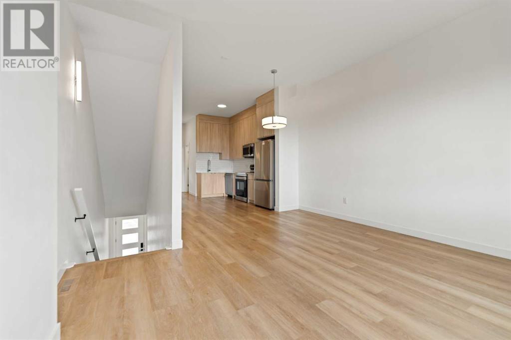 402, 101 Panatella Square Nw, Calgary, Alberta  T3K 2R9 - Photo 8 - A2204211