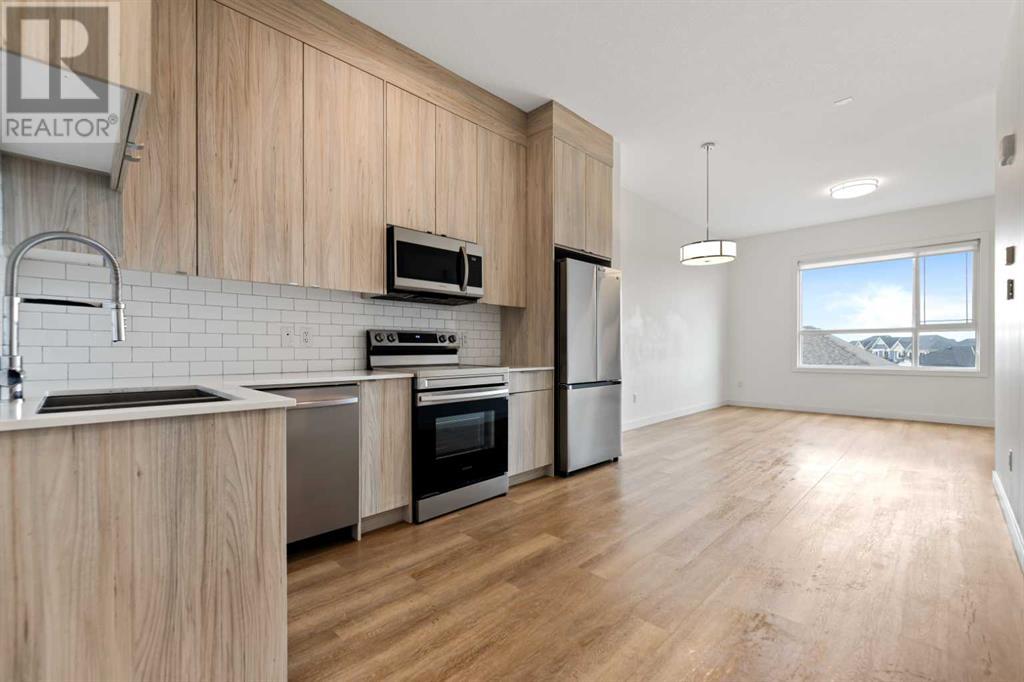 402, 101 Panatella Square Nw, Calgary, Alberta  T3K 2R9 - Photo 13 - A2204211