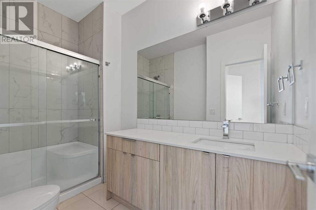 402, 101 Panatella Square Nw, Calgary, Alberta  T3K 2R9 - Photo 19 - A2204211