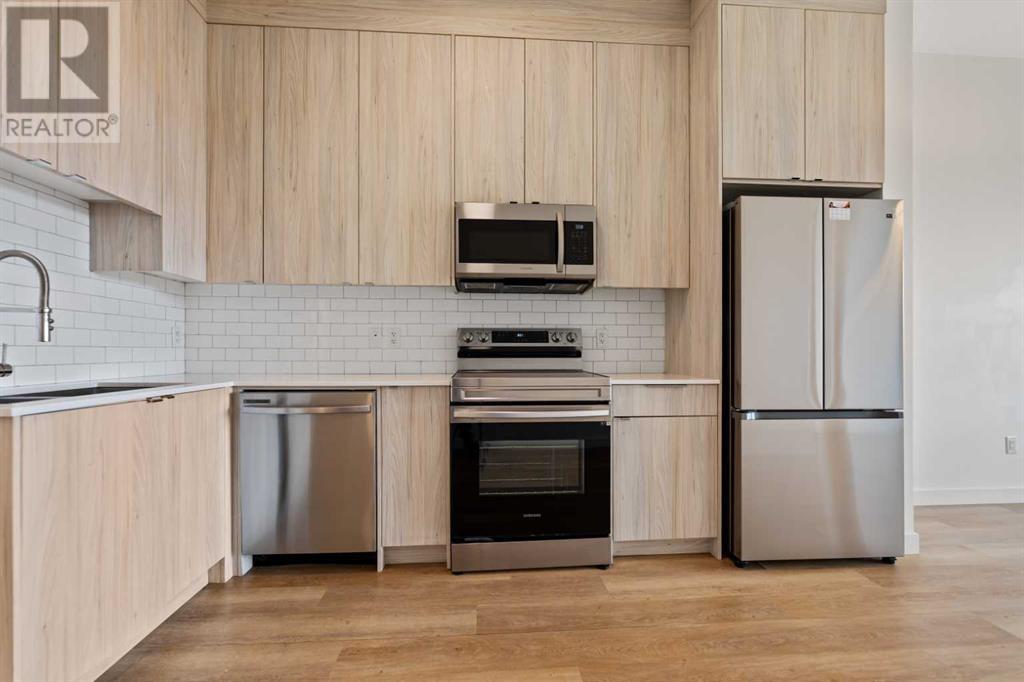402, 101 Panatella Square Nw, Calgary, Alberta  T3K 2R9 - Photo 14 - A2204211