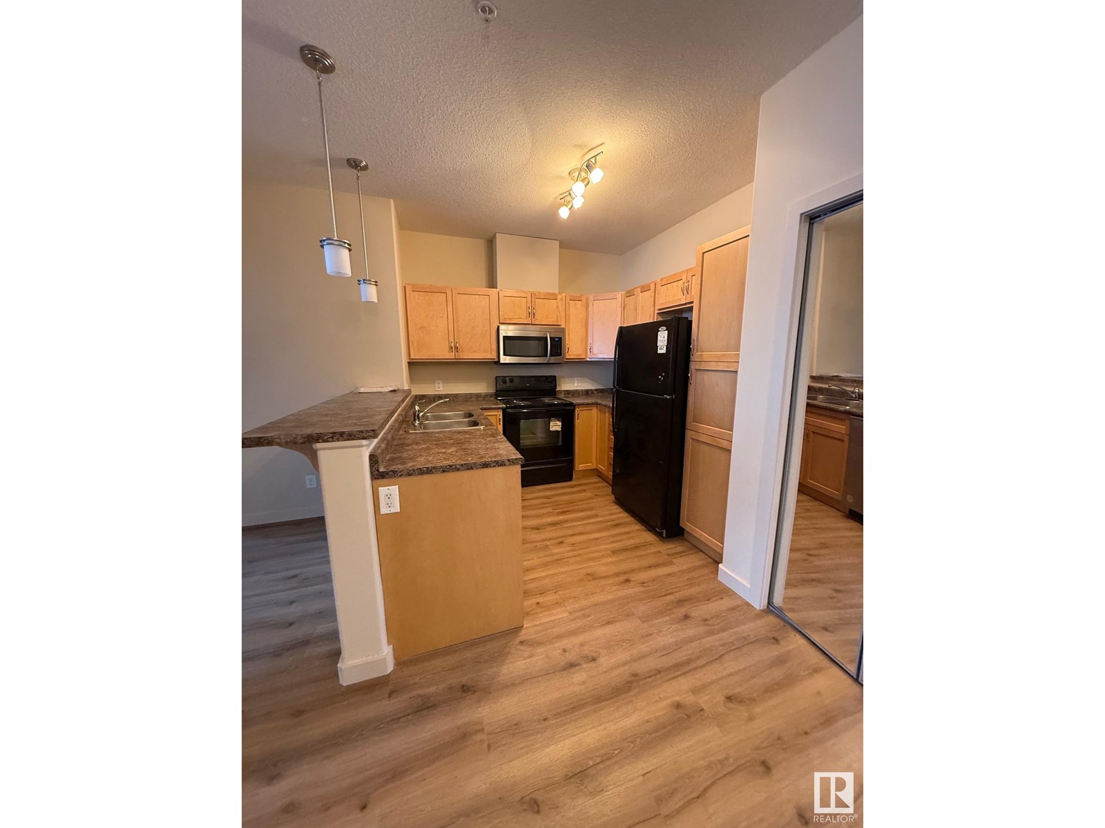 Property at #216 304 AMBLESIDE LINK LI SW image 2
